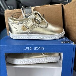 Size 4c gold keds.